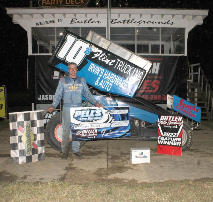Jason Blonde poses in Victory Lane after securing his first win at Butler Motor Speedway since the 1999 season after taking first in the Pell&#x002019;s Tire Service Sprint Division