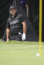 Patrick Reed of United States follows his shot from a bunker during the final round for the WGC-Mexico Championship golf tournament, at the Chapultepec Golf Club in Mexico City, Sunday, Feb. 23, 2020.(AP Photo/Fernando Llano)