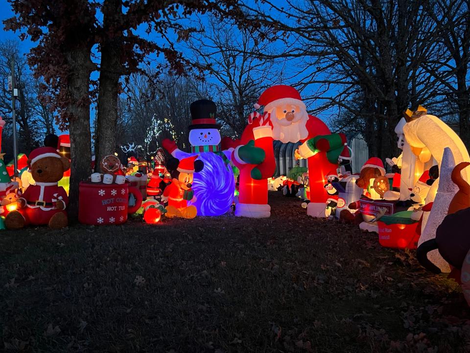 The Bradley Christmas display features around 250 inflatables, blow bolds, lit trees and letters to Santa Claus on the front porch. Last year, homeowners Kevin and Valinda Bradley opened the bake shop that will be open again this year. Visitors may purchase treats and hot chocolate to have while walking around the yard. Expenses go back to the Bradleys for maintaining their annual display. New this year is a memorial tree by the front porch, where visitors may place the name of a loved one.