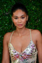 <p>The Victoria’s Secret Angel made a head-turning appearance at the #REVOLVEawards in a sequin dress, hoop earrings, and lustrous pink lips. (Photo: Getty Images) </p>