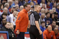 Kansas head coach Bill Self gets in the ear of an official just before receiving a technical foul during the first half of an NCAA college basketball game against TCU on Saturday, Jan. 21, 2023, at Allen Fieldhouse in Lawrence, Kan. (AP Photo/Nick Krug)