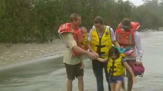 A family was rescued from floodwaters in Cooktown. Source: 7News