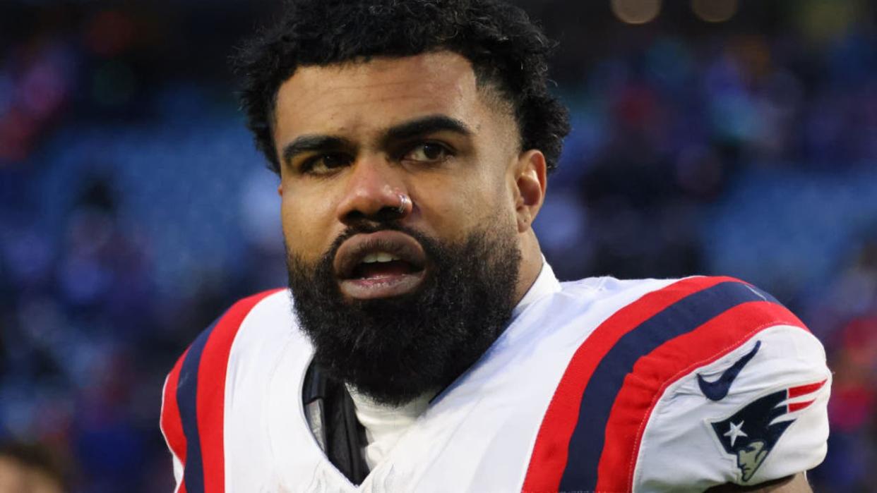 <div>ORCHARD PARK, NEW YORK - DECEMBER 31: Ezekiel Elliott #15 of the New England Patriots looks on after a game against the Buffalo Bills at Highmark Stadium on December 31, 2023 in Orchard Park, New York. (Photo by Timothy T Ludwig/Getty Images)</div>