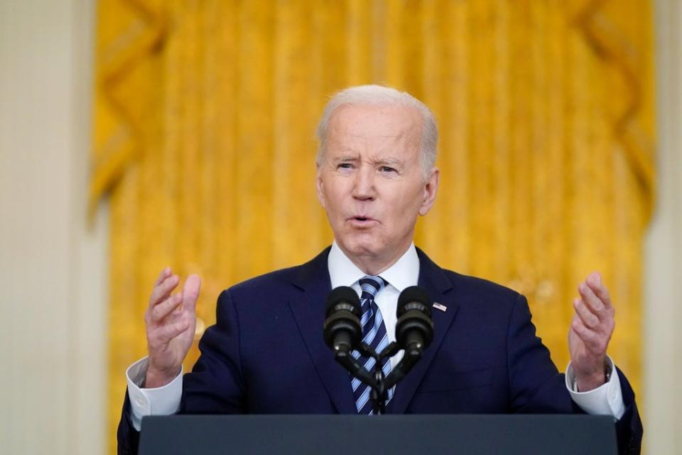 President Joe Biden unveiling a series of sanctions on Thursday (AP)