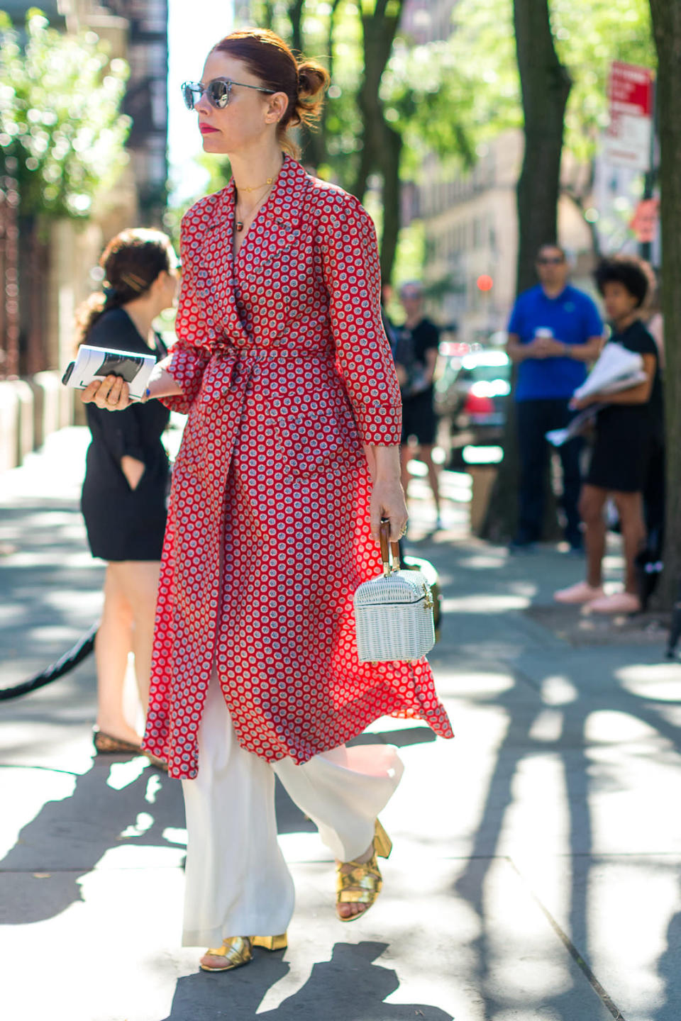 Refinery29 Editor in Chief Christene Barberich is known for her impeccable mix of new and vintage, and this white wicker bag has charm to spare, at New York Fashion Week.