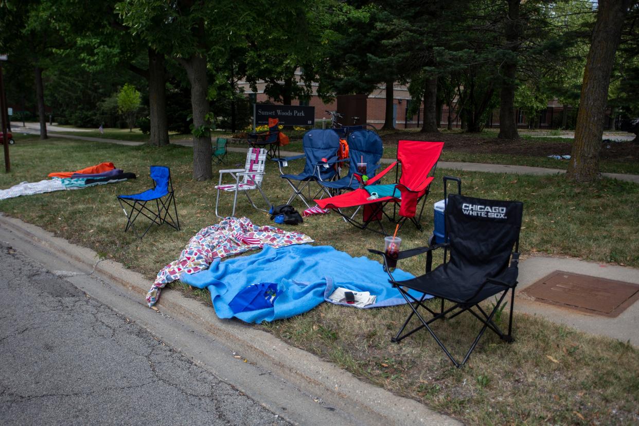 Chairs and blankets are left abandoned after a shooting at a Fourth of July parade on July 4, 2022 in Highland Park, Illinois. 