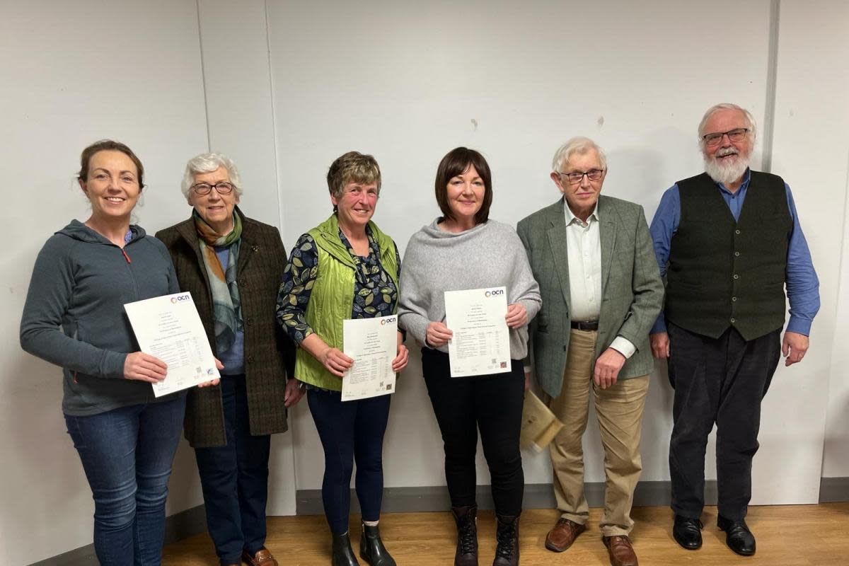 Aine Enright, Ethel Irvine, Mary McGonigle and Jenny Parkes with Brian Dane (tutor) and Stephen Hey (Chairman, FBA).