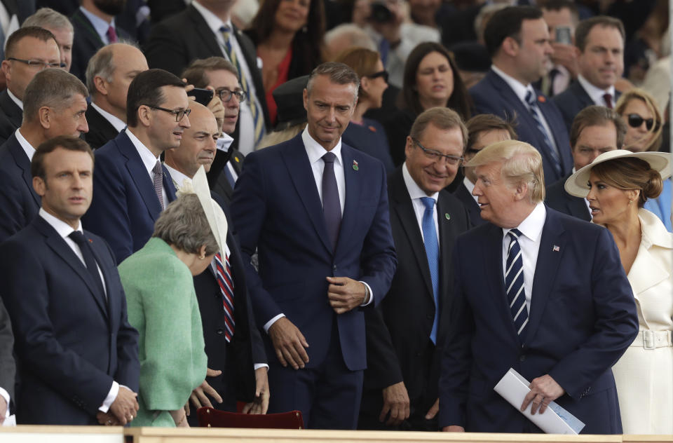 President Donald Trump and first lady Melania Trump, right, arrive for an event to mark the 75th anniversary of D-Day in Portsmouth, England Wednesday, June 5, 2019. World leaders including U.S. President Donald Trump are gathering Wednesday on the south coast of England to mark the 75th anniversary of the D-Day landings. (AP Photo/Matt Dunham)