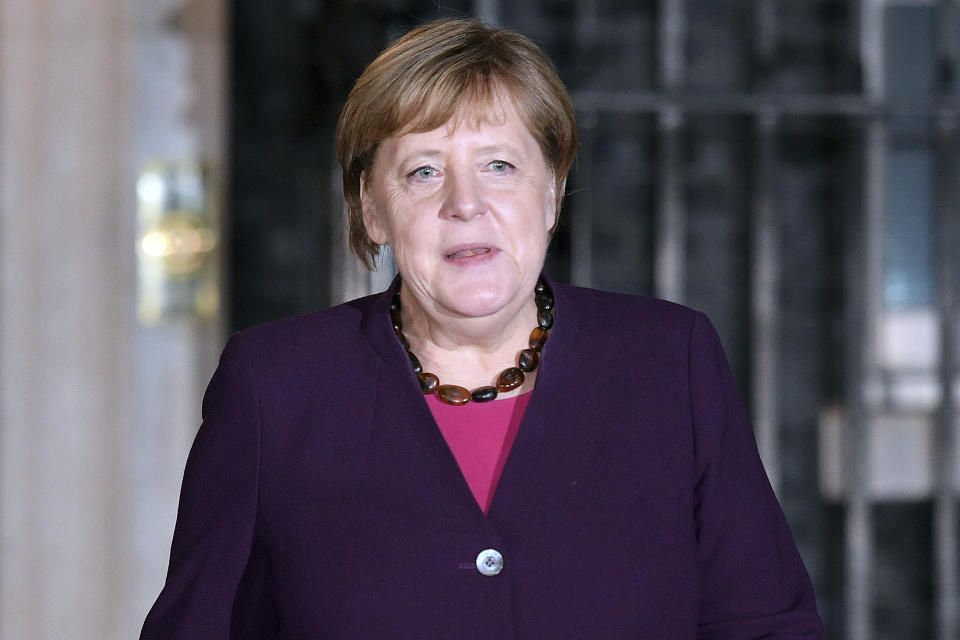 German Chancellor Angela Merkel leaves 10 Downing Street after meeting with Britain's Prime Minister Boris Johnson and other heads of State, ahead of the NATO summit, in London, Tuesday, Dec. 3, 2019. U.S. President Donald Trump and his NATO counterparts were gathering in London Tuesday to mark the alliance's 70th birthday amid deep tensions as spats between leaders expose a lack of unity that risks undermining military organization's credibility. (Daniel Leal-Olivas/Pool Photo via AP)