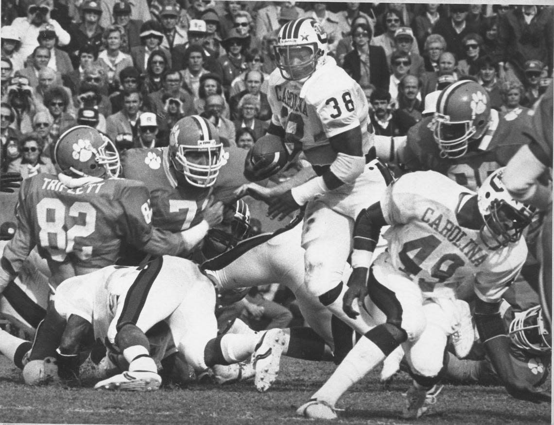 In 1980, George Rogers looks for running room against Clemson.