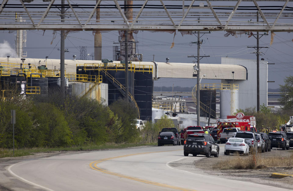 Emergency crews respond to an explosion at the Seneca Petroleum Company in Lemont, Ill., Tuesday, April 25, 2023. An explosion at the suburban Chicago petroleum plant killed one person and injured a second Tuesday morning, authorities said. (Eileen T. Meslar/Chicago Tribune via AP)