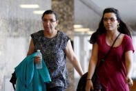 Rosemary Hernandez, (L) the wife of Pedro Hernandez, arrives for court at the New York State Supreme Court in the Manhattan borough of New York City, U.S. October 19, 2016. REUTERS/Brendan McDermid