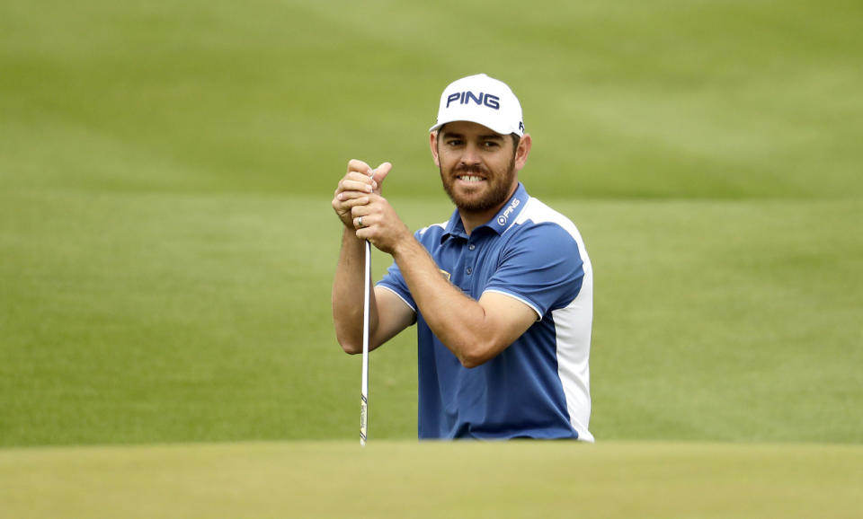 <p>Louis Oosthuizen, of South Africa, watches his shot onto the 14th green during semifinal round play against Rafa Cabrera Bello of Spain at the Dell Match Play Championship golf tournament at Austin Country Club Sunday, March 27, 2016, in Austin, Texas. (AP Photo/Charlie Riedel)</p>