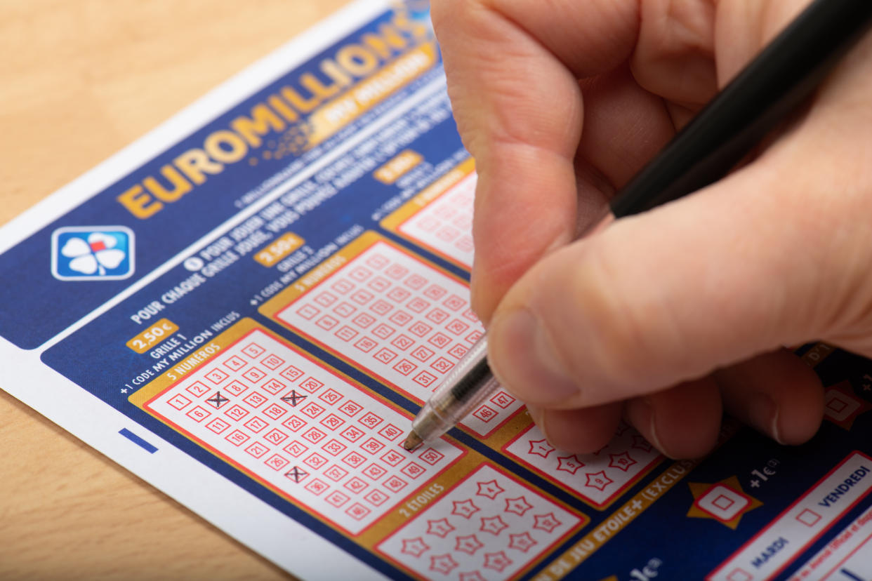 Paris, France -  November 21, 2019 : Closeup of aperson filling a lotto grid , Euromillions,   from the society FDJ  (La francaise des jeux)