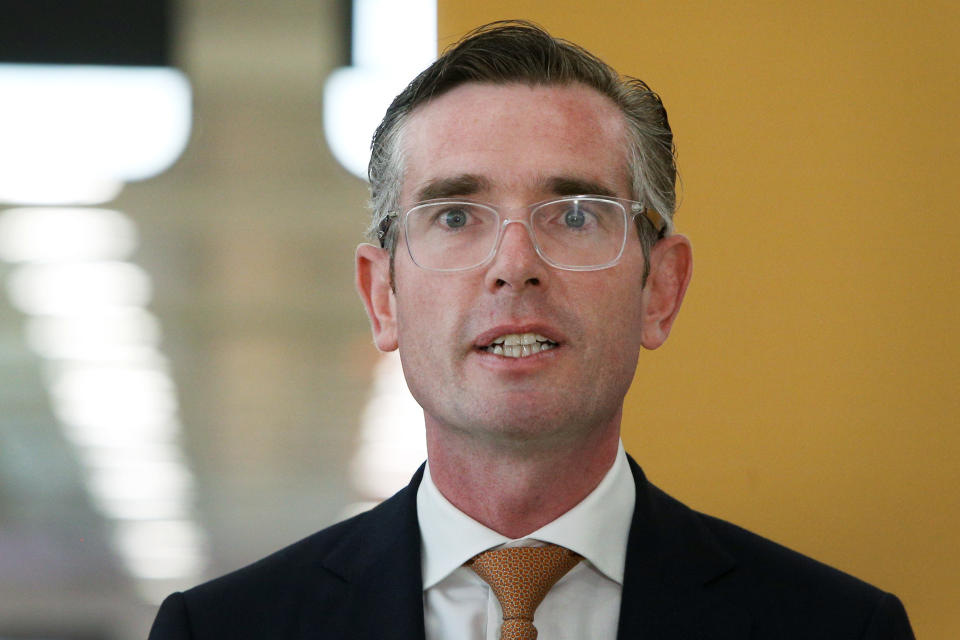 Seen here, NSW Premier Dominic Perrottet addresses media at a press conference in Sydney.