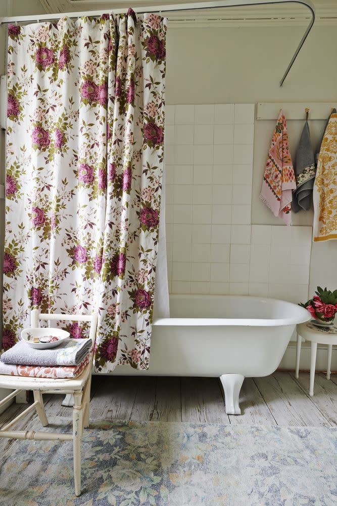 <p>The worst thing you can do in a small bathroom is strip away all character. Some framed artwork, an antique chair to hold towels, pretty bath curtains – any decorative detailing will go a long way in making a cramped space more welcoming. </p>