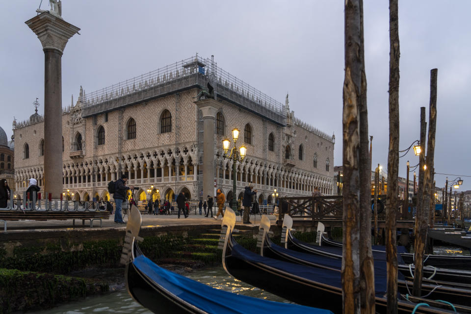External view of the Palazzo Ducale in Venice, northern Italy, Tuesday, Dec. 6, 2022. The Doge's Palace, the heart of the political life of the Venetian Republic for centuries, is undergoing a major reconnaissance of its conservation status by the Fondazione Musei Civici of the municipality of Venice that includes the urgent restoration of its paintings and infrastructures, which is expected to be completed in the summer of 2023. (AP Photo/Domenico Stinellis)