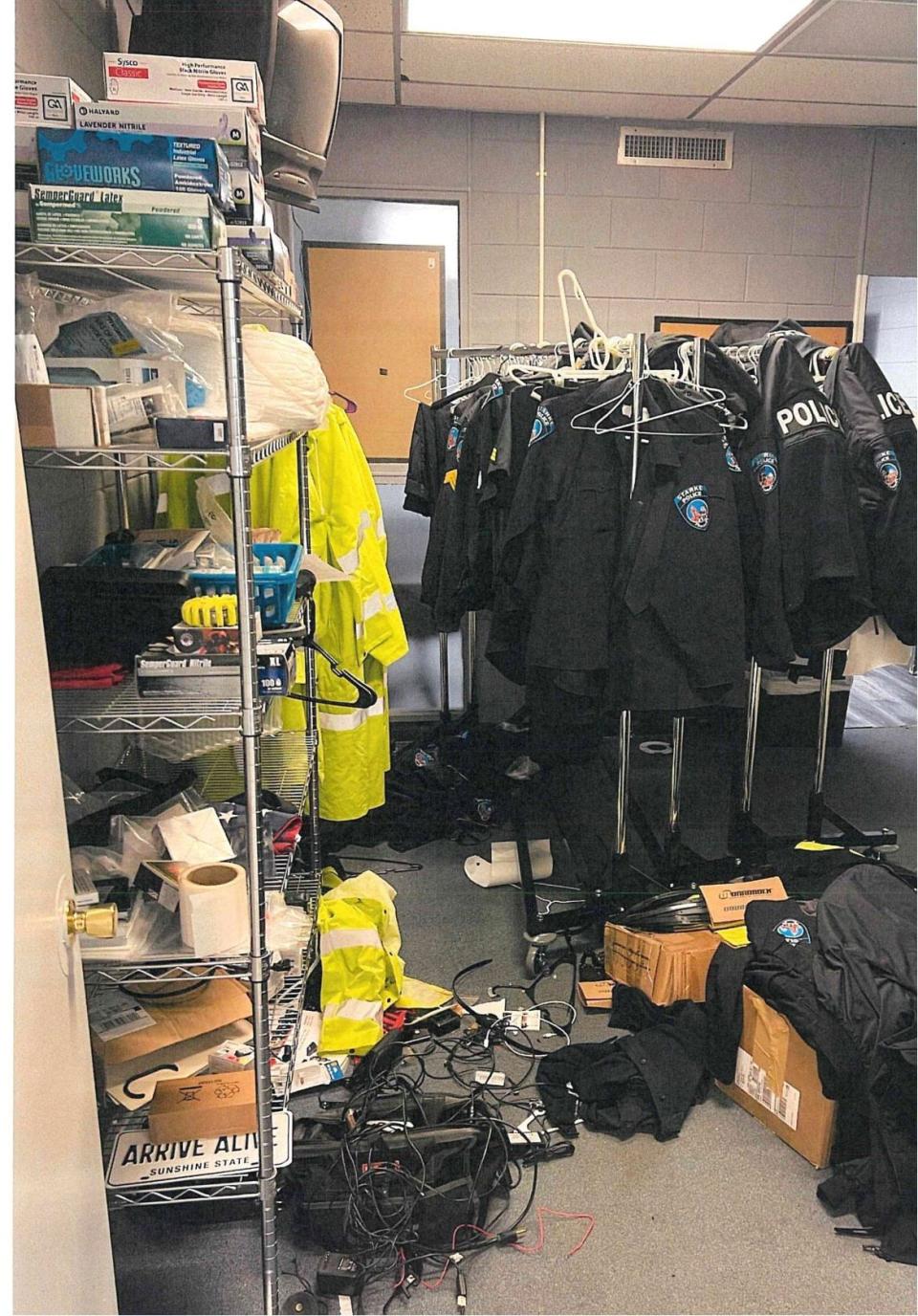 This photo in the memo showed uniforms were not secured and were just thrown into a room.