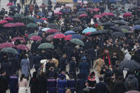 Delegates leave after the opening session of the The National People's Congress (NPC) at the Great Hall of the People in Beijing, China, Tuesday, March 5, 2024. (AP Photo/Andy Wong)