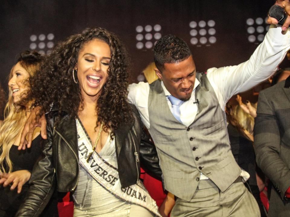 Brittany Bell and Nick Cannon at The Maxim Superbowl party on January 31, 2015 in Scottsdale, Arizona