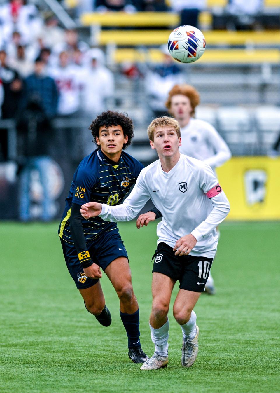 Bradley Poppell of Moeller, right, is the Enquirer's 2023 boys soccer player of the year in Division I.