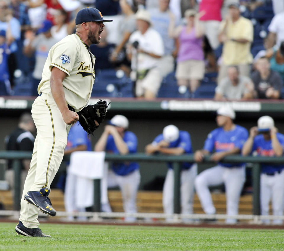 Kent State closing pitcher Josh Pierce celebrates the last out against Florida in an NCAA College World Series elimination baseball game in Omaha, Neb., Monday, June 18, 2012. Kent State won 5-4. (AP Photo/Eric Francis)