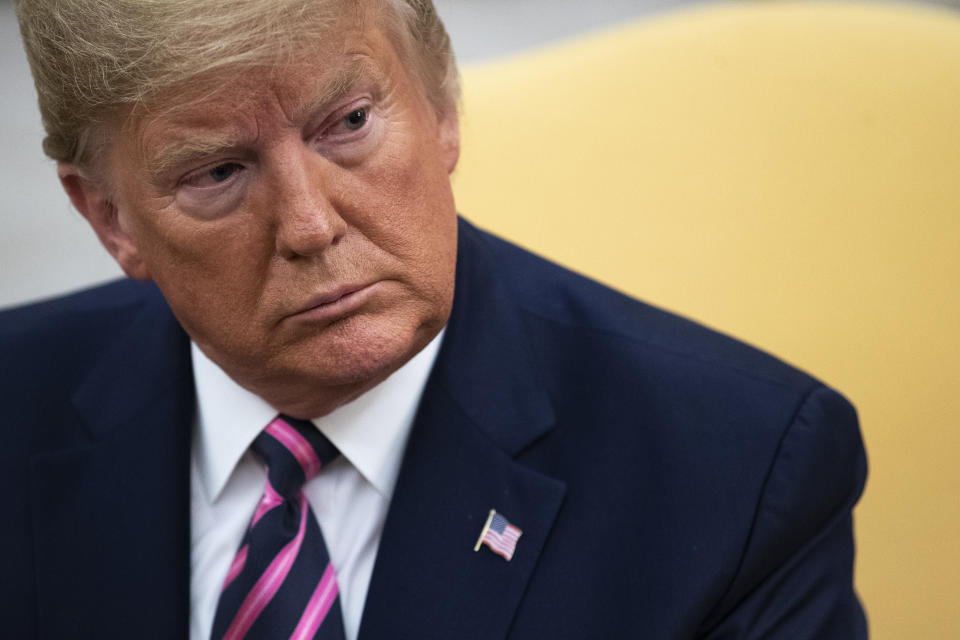 WASHINGTON, DC  DECEMBER 19: U.S. President Donald Trump looks on in the Oval Office of the White House as he meets with U.S. Representative Jeff Van Drew of New Jersey, who has announced he is switching from the Democratic to Republican Party, on December 19, 2019 in Washington, DC. Van Drew voted against the two articles of impeachment yesterday in the House of Representatives. (Photo by Drew Angerer/Getty Images)