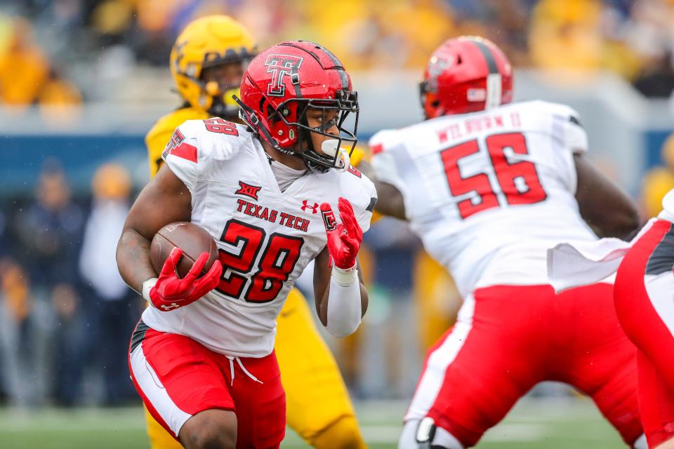 Texas Tech running back Tahj Brooks (28) has 162 carries for 891 yards, both second in the FBS. His average of 111.4 yards rushing per game ranks seventh.