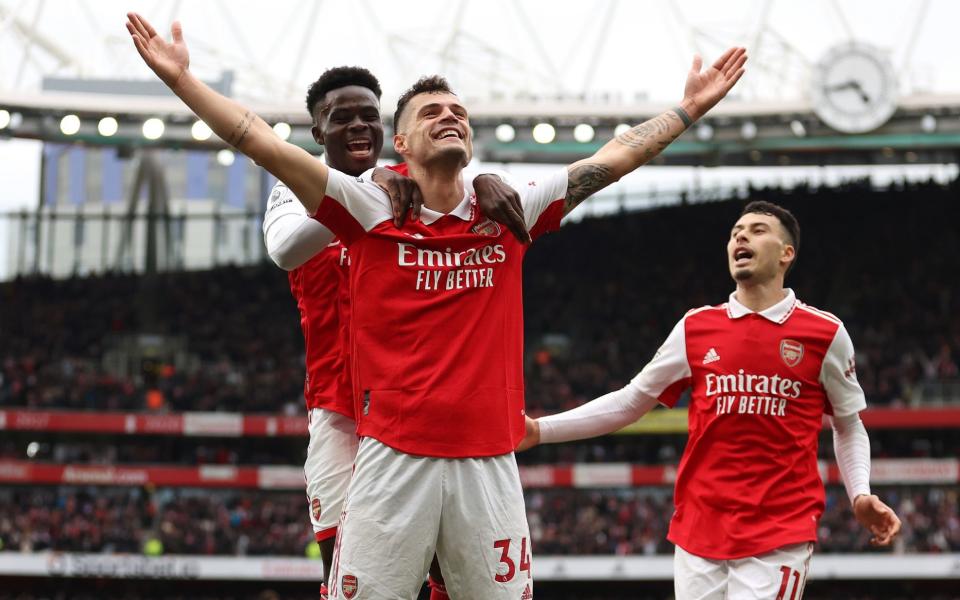 Granit Xhaka of Arsenal celebrates scoring the team's fourth goal during the Premier League match between Arsenal FC and Leeds United - Getty Images/Julian Finney