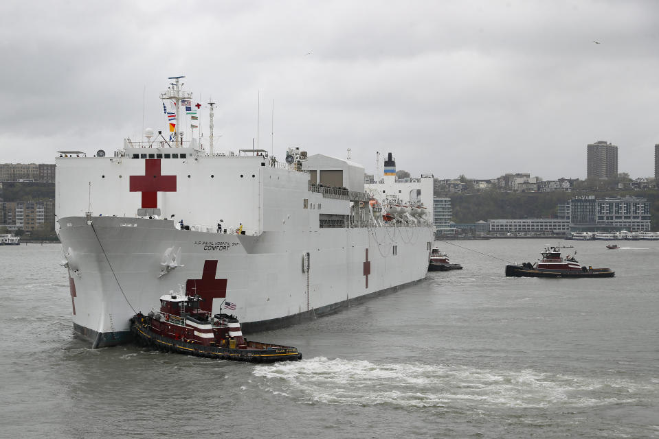 The USNS Naval Hospital Ship Comfort departs via the Hudson River, Thursday, April 30, 2020, in the Manhattan borough of New York. (AP Photo/John Minchillo)