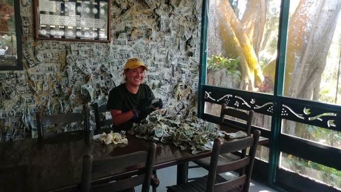 Cabbage Key's famous dollar bill bar, shown here in 2020, is still standing after Hurricane Ian according to owner Rob Wells.