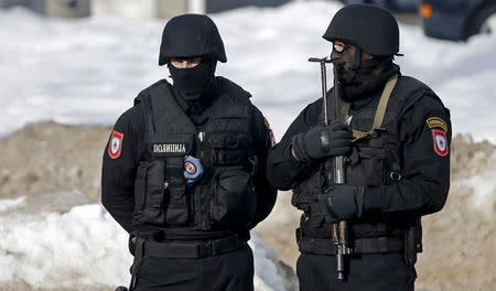 Police officers stand watch before Serbian Prime Minister Aleksandar Vucic's official visit to Banja Luka, Bosnia and Herzegovina, January 9, 2015. REUTERS/Dado Ruvic