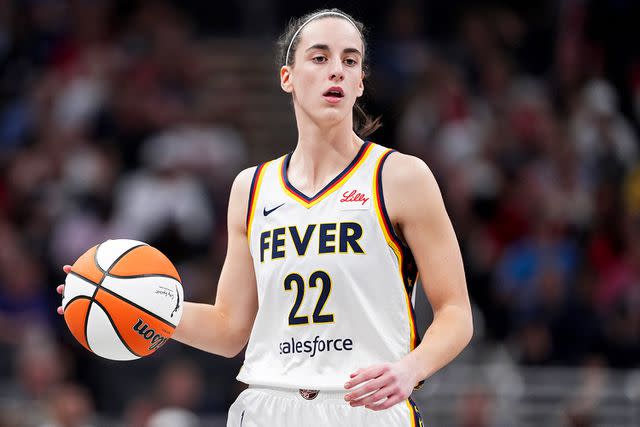 <p>Emilee Chinn/Getty</p> Caitlin Clark #22 of the Indiana Fever during a game between the Fever and the Connecticut Sun