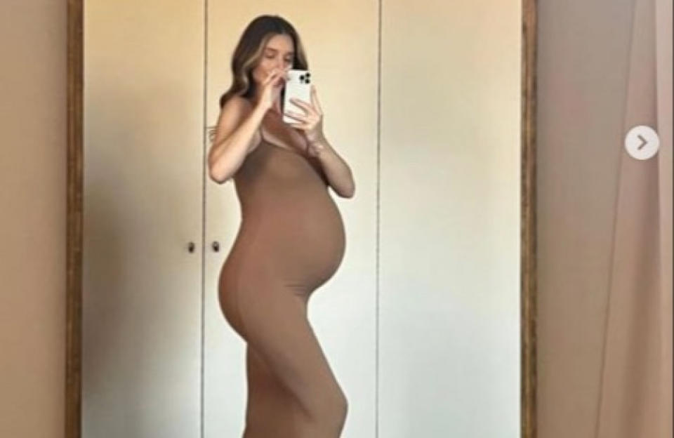 Supermodel Rosie Huntington-Whiteley is counting down the days until she and her man Jason Statham meet their new baby. Rosie showed off her big bump as she posed in camel coloured dress.
