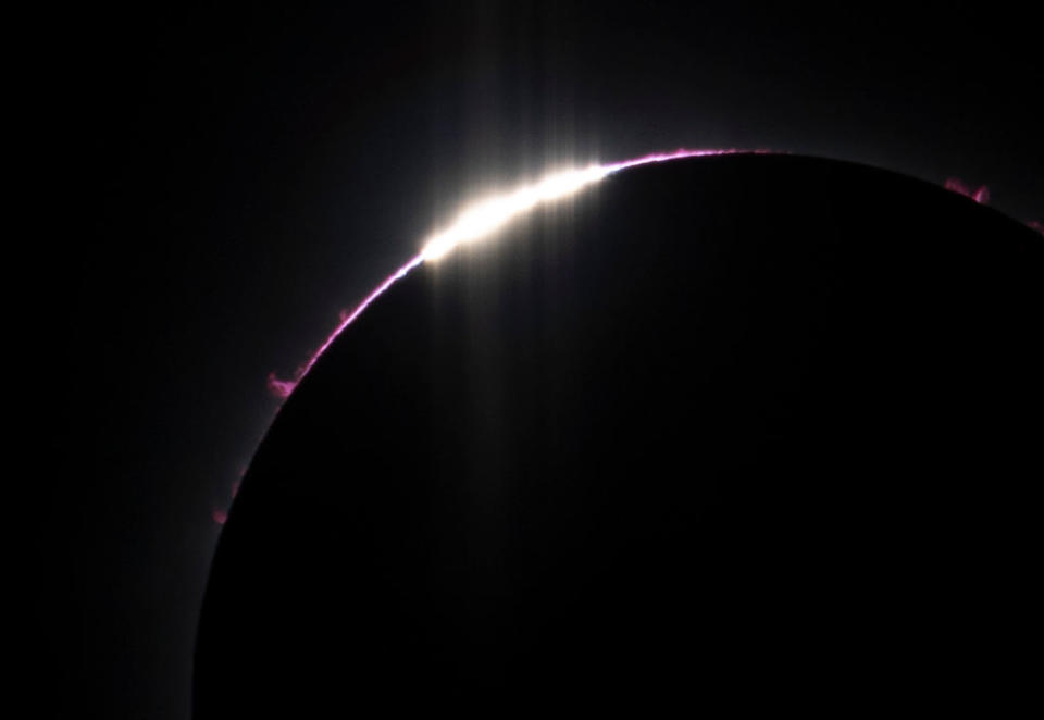 The moon passes in front of the sun during a total eclipse in Bloomington. The solar eclipse, which was seen from Mexico, the United States, and Canada, was the first one to pass over the American state of Indiana since 1869