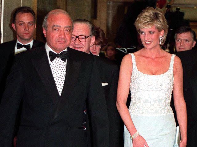 <p>Jayne Fincher/Getty</p> Princess Diana and Mohammed Al Fayed attending a charity dinner for the Harefield Heart Unit held at Harrods London in February 1996.