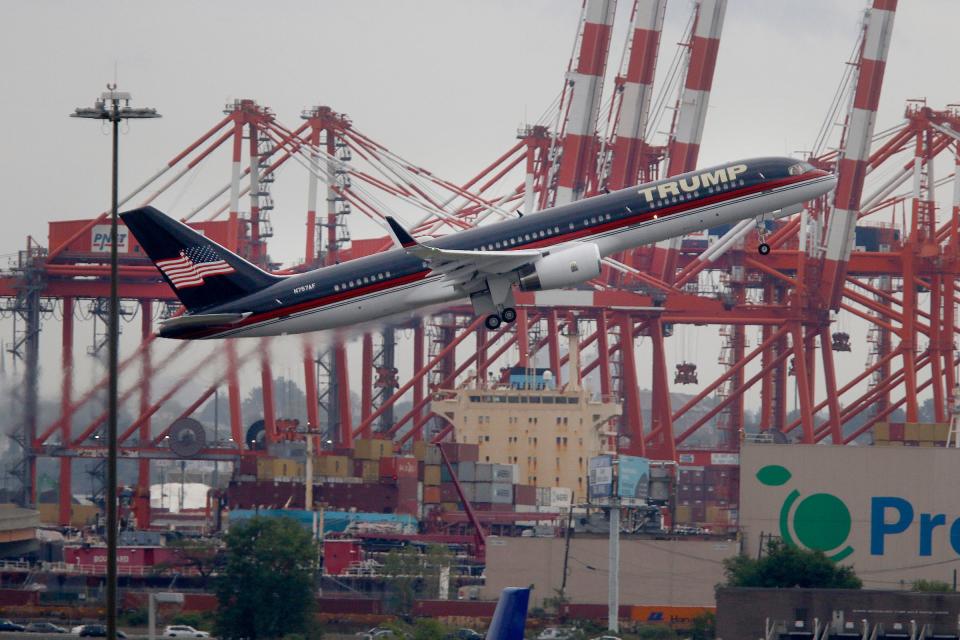 Former President Donald Trump's aircraft departs Newark (NJ) Liberty International Airport Thursday afternoon, August 24, 2023. He is flying to Atlanta to be booked on racketeering and conspiracy charges. Port Newark can be seen in the background. (Via OlyDrop)