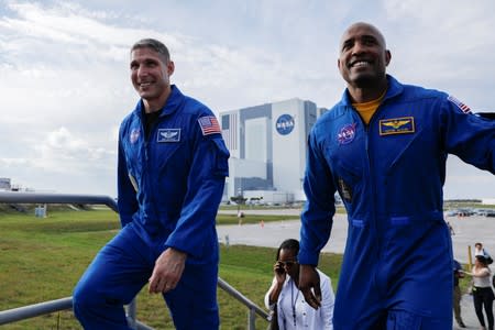 NASA commercial crew astronauts at Kennedy Space Center before SpaceX Crew Dragon spacecraft test flight