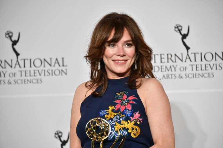 Anna Friel poses with award for best performance by an actress for her work in "Marcella" at the 45th International Emmy Awards