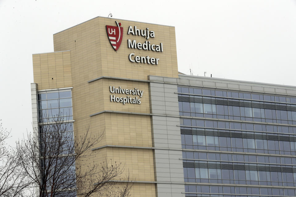 This photo shows the exterior of University Hospital Ahuja Medical Center, Monday, March 12, 2018, in Beachwood, Ohio. The former lab director at a fertility clinic where a malfunctioning storage tank destroyed thousands of frozen eggs and embryos in 2018 is blaming what he described as bungling staff and administrators who ignored his warnings. The claims made in legal filings in April 2021 have ignited a flurry of accusations between University Hospitals in Cleveland and its former employee and his attorney. (AP Photo/Tony Dejak, File)