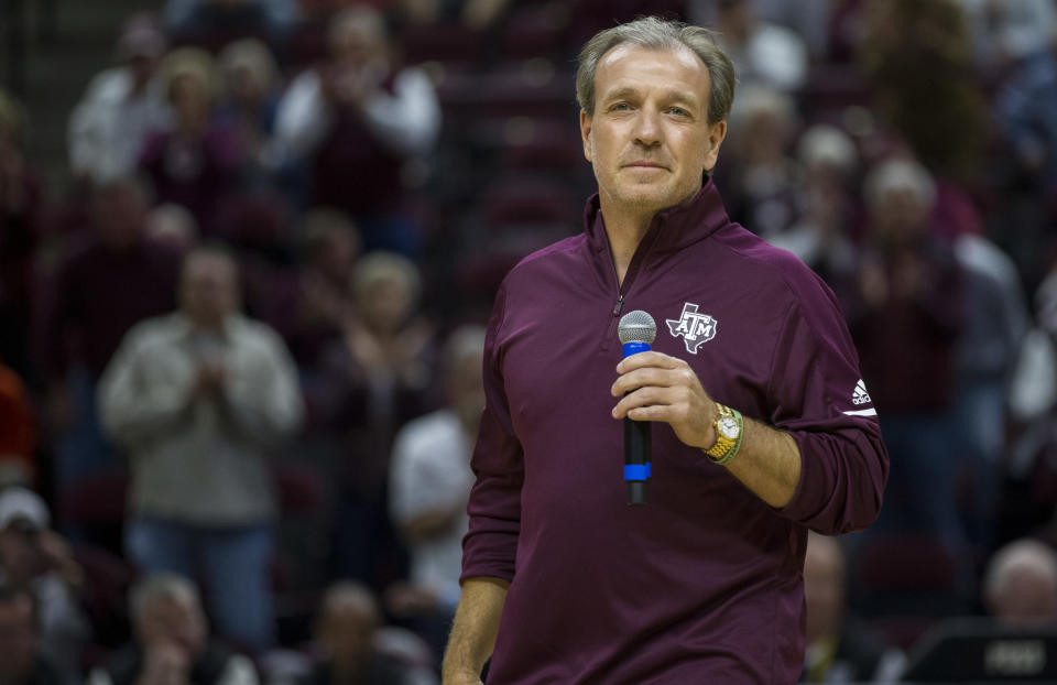 Texas A&M head football coach Jimbo Fisher talks to the crowd at Reed Arena during a timeout of an NCAA college basketball game between Prairie View A&M and Texas A&M Saturday, Dec. 9, 2017, in College Station, Texas. (AP Photo/Sam Craft)