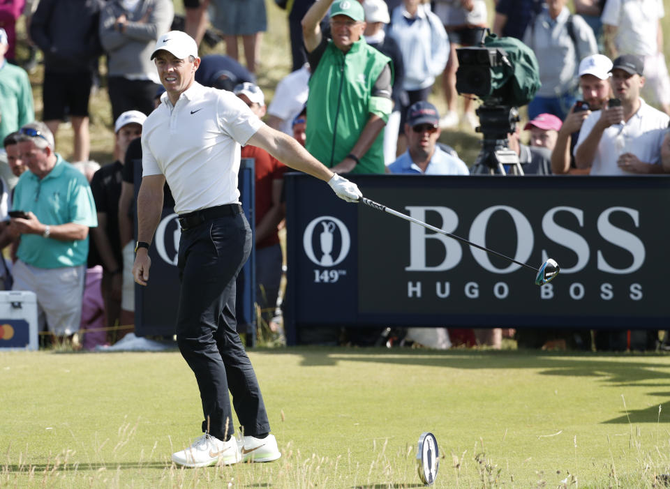 Northern Ireland's Rory McIlroy gestures with his club that the ball has gone left from the tee shot on the 7th during the first round British Open Golf Championship at Royal St George's golf course Sandwich, England, Thursday, July 15, 2021. (AP Photo/Peter Morrison)