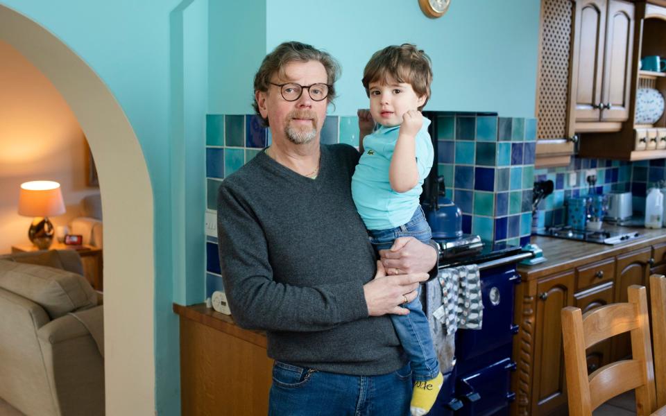 Your Money. Investing in Junior ISAs. John Jennings and his two year-old grandson Freddie at home in Colston Bassett, Nottinghamshire. - Andrew Fox