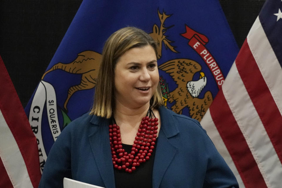 FILE- U.S. Rep. Elissa Slotkin, D-Mich., receives the support of Rep. Liz Cheney, R-Wyo., during a campaign rally, Tuesday, Nov. 1, 2022, in East Lansing, Mich. Slotkin emphasized how a shared concern for a functioning democracy can unite Democrats and Republicans despite policy disagreements. (AP Photo/Carlos Osorio_File)