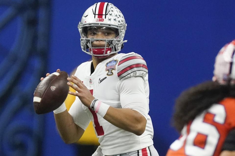 Ohio State quarterback Justin Fields passes against Clemson during the second half of the Sugar Bowl NCAA college football.