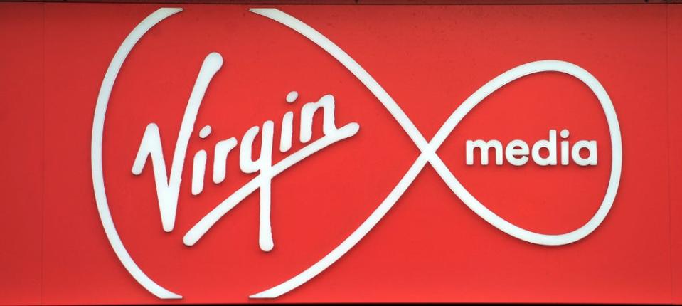 A shop sign for Virgin media in central London (PA) (PA Archive)