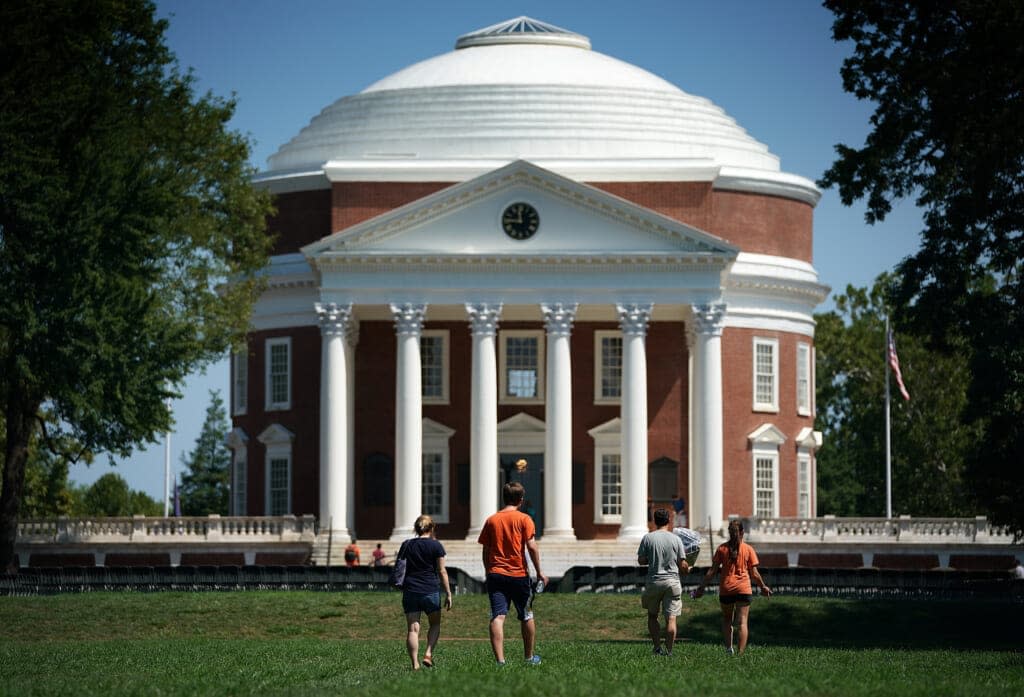 Students return to the University of Virginia for the fall semester on August 19, 2017, in Charlottesville, Virginia, a week after the city was placed in the national spotlight when white supremacists staged a violent rally protesting the removal of a statue of Robert E. Lee. Three people have been killed, and two others were wounded in a shooting at the University of Virginia on Sunday, Nov. 13. (Photo by Win McNamee/Getty Images)