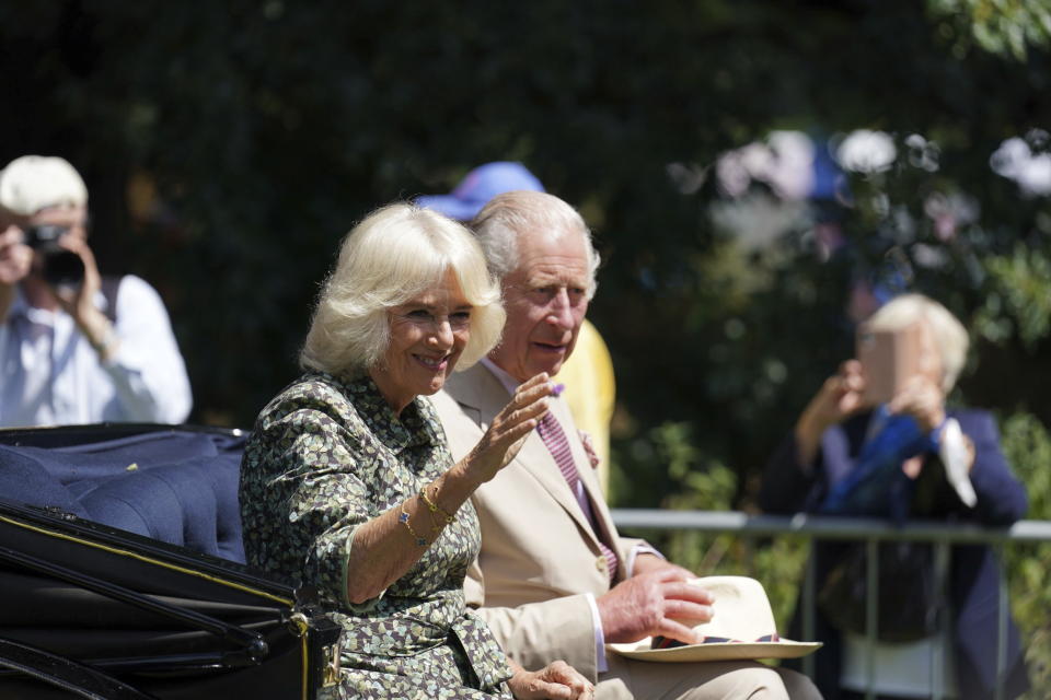 King Charles III and Queen Camilla arrive for a visit to the Sandringham Flower Show at Sandringham House in Norfolk, Britain, Wednesday July 26, 2023. (Joe Giddens/PA via AP)