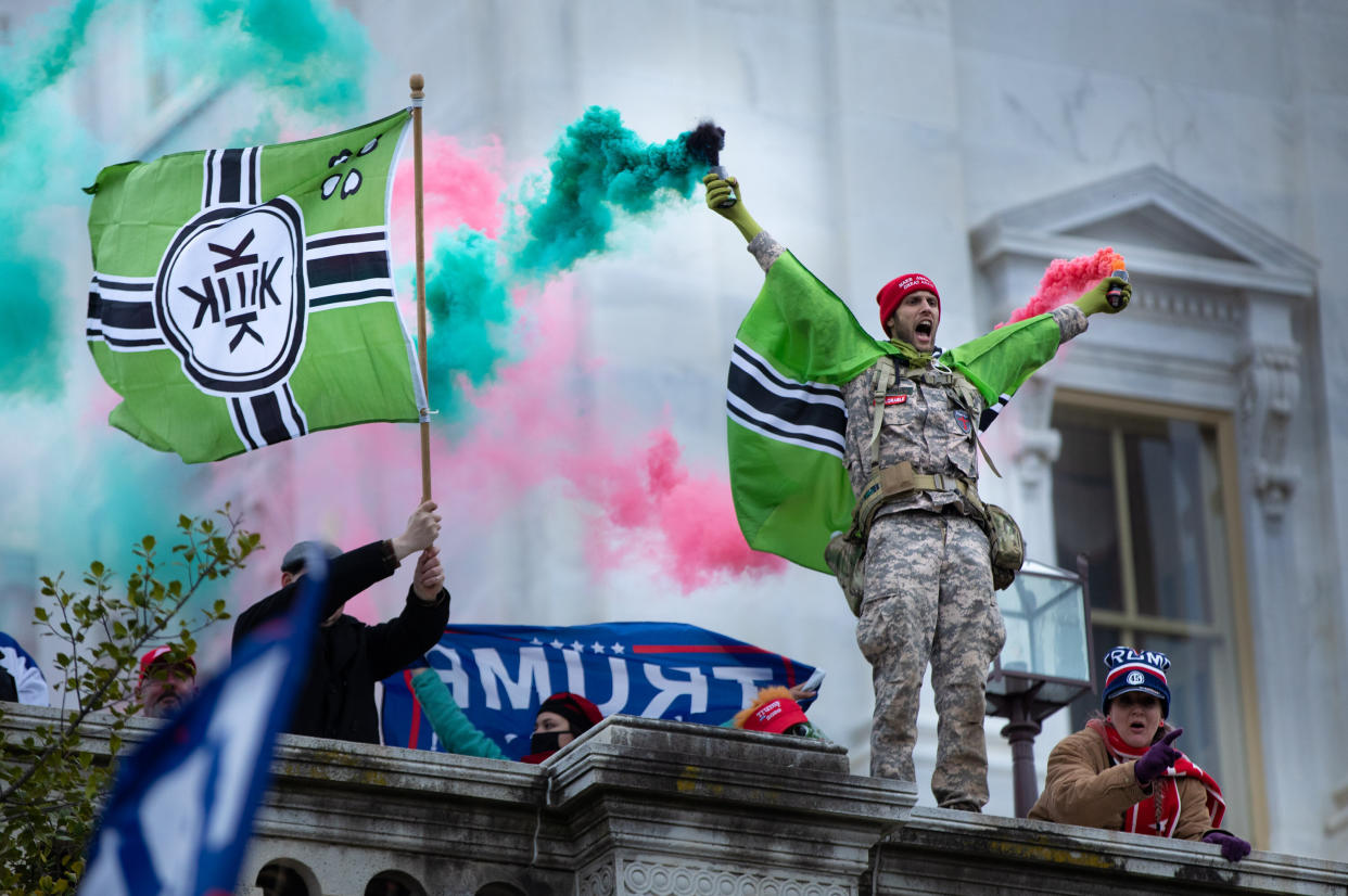 A supporter of then-President Donald Trump wore camouflage as he and thousands of others stormed the U.S. Capitol on Jan. 6. (Photo: The Washington Post via Getty Images)