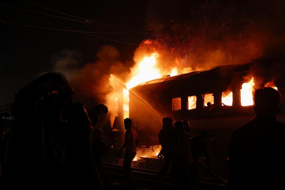 Four people were killed when a passenger train caught fire in the capital in ‘an act of sabotage’ ahead of the election (Reuters)